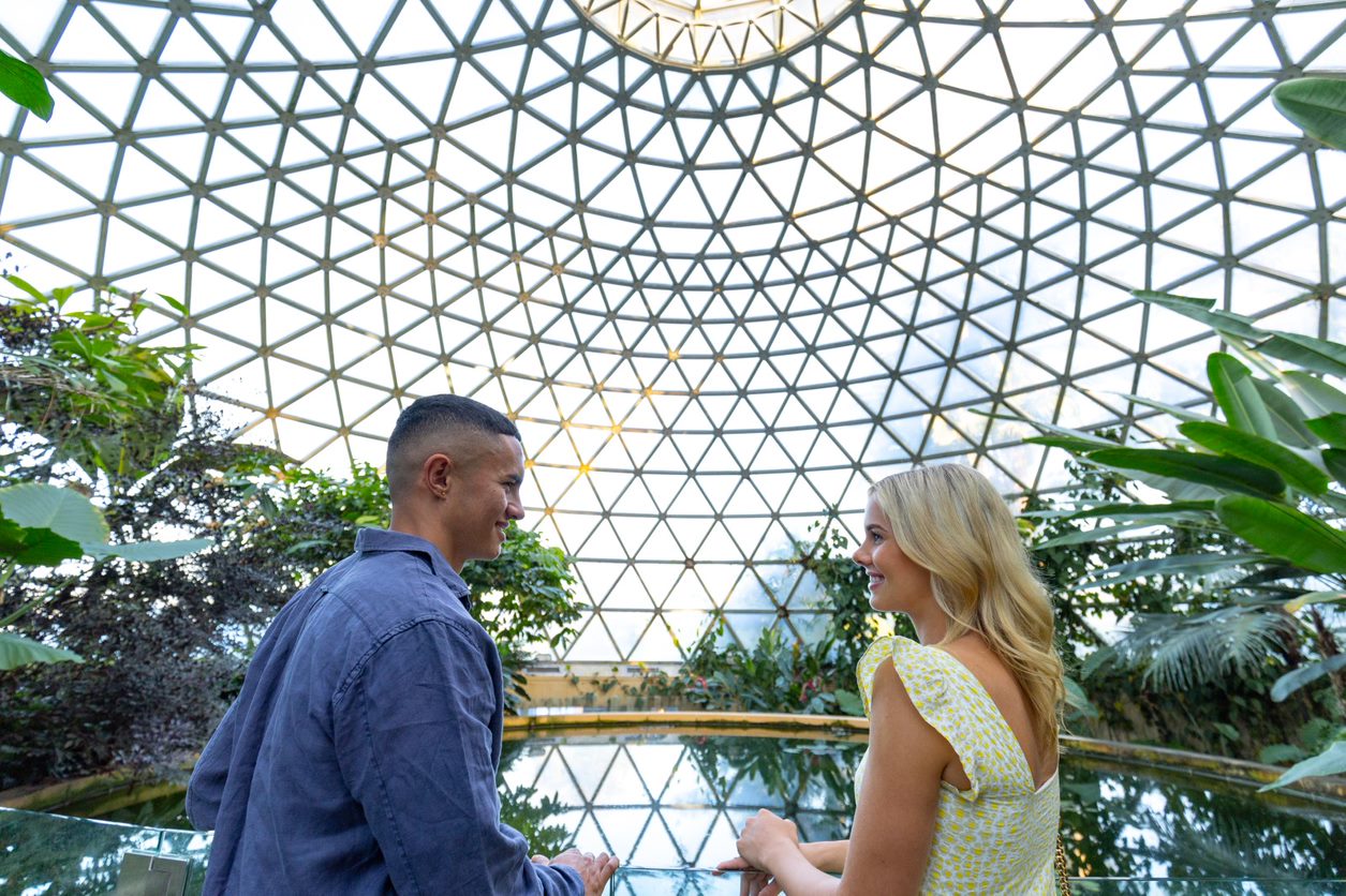 A man and a woman experience the Mount Coot-tha Tropical Dome
