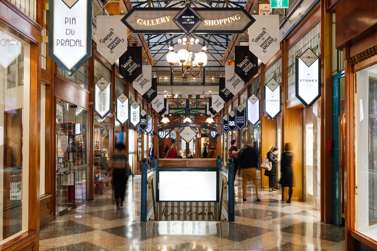 Image of store fronts and signage at shopping centre, Brisbane Arcade, Queen Street.