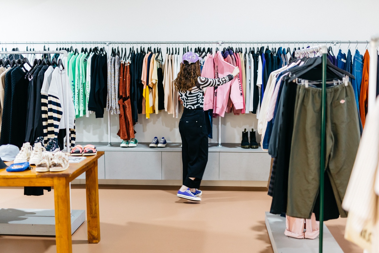 Woman looking at clothing in Double Double