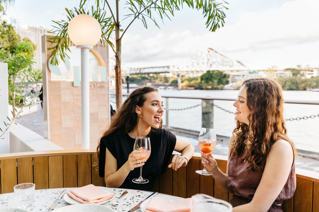 Two women dining at Opa in Brisbane City