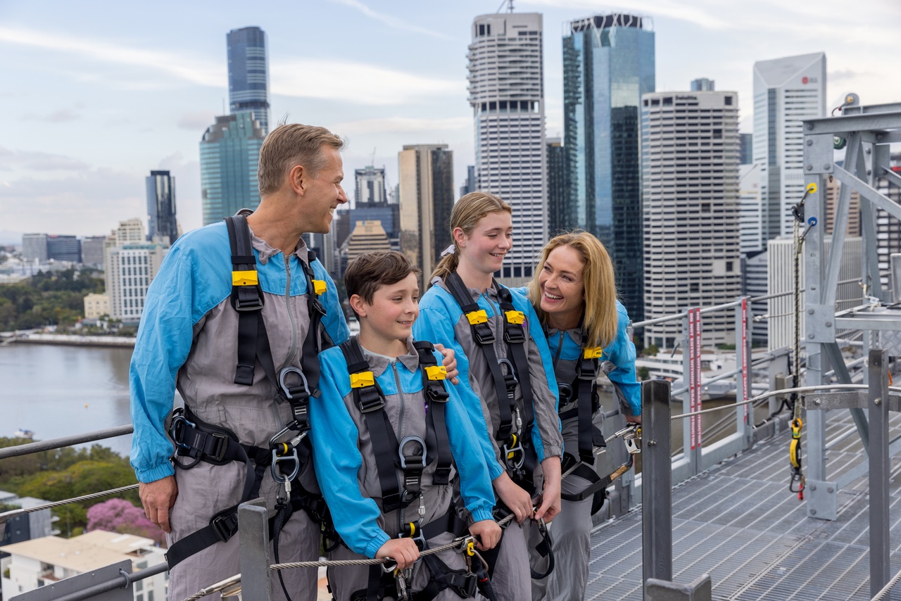 A family of four enjoying the views from the Story Bridge climb.