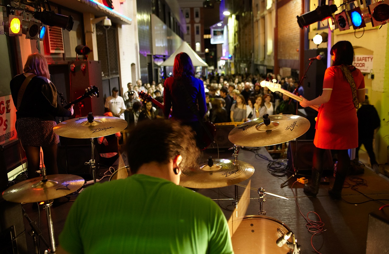 An image of live music at a laneway.
