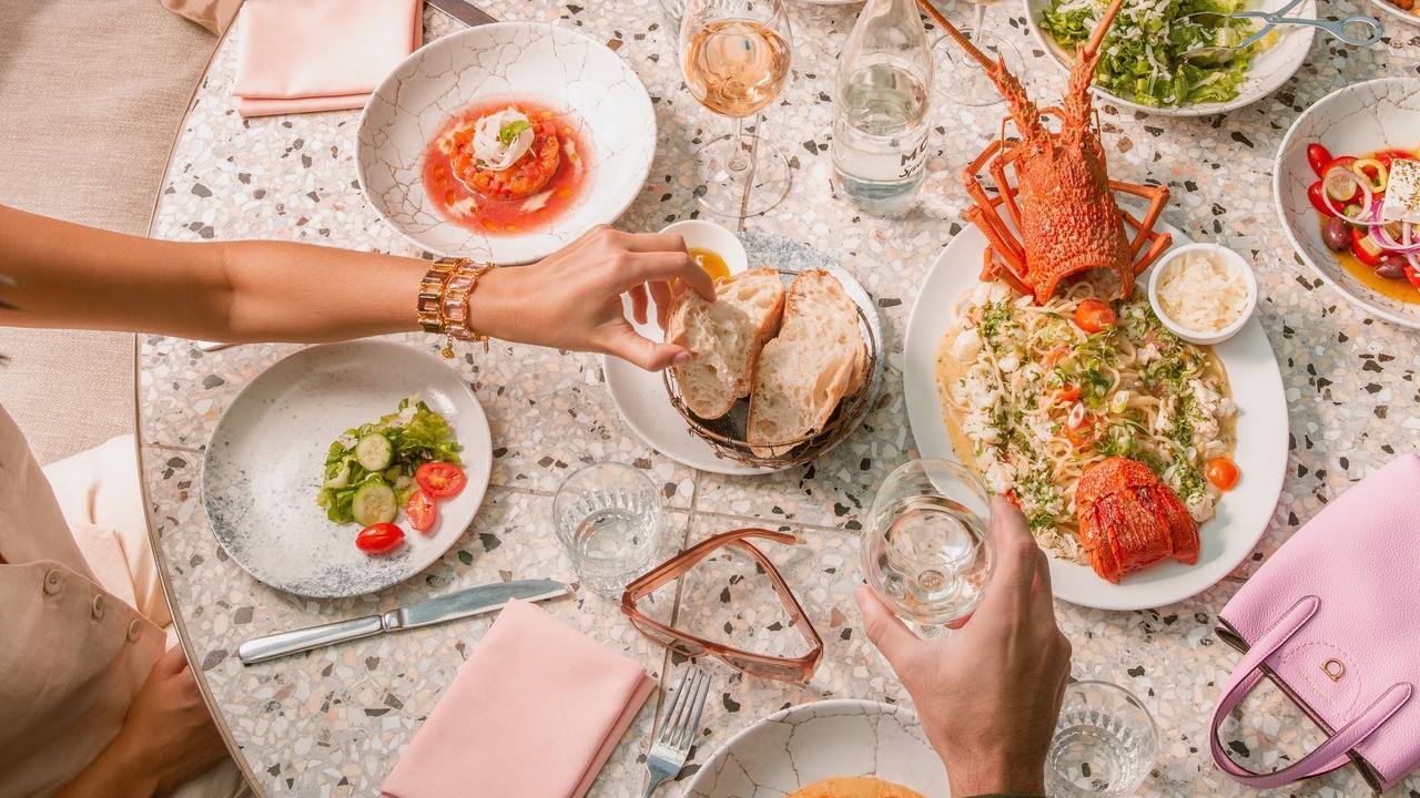 Lobster, salads and drinks at Opa in Brisbane City