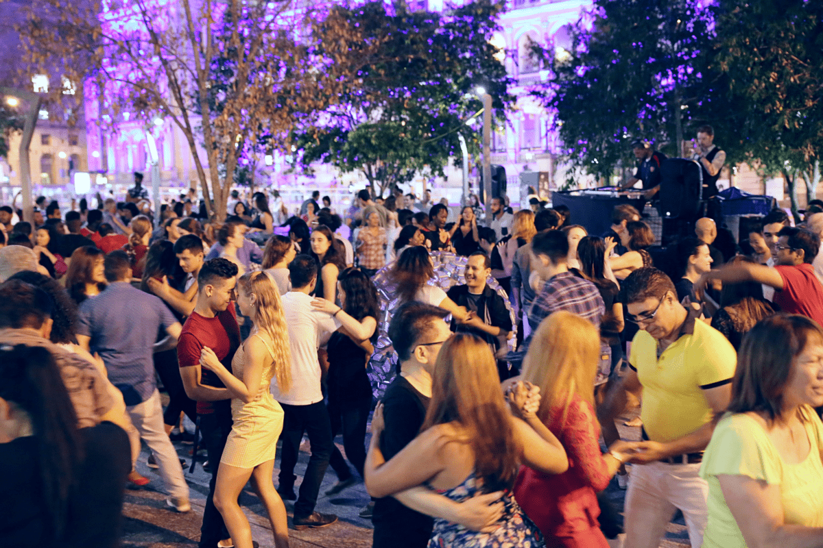 People dancing at Latin Friday night.