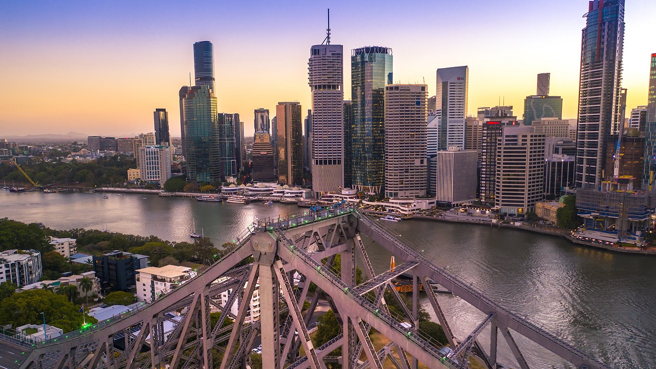 Story Bridge with climbers at sunset Brisbane City Brit in Brisbane