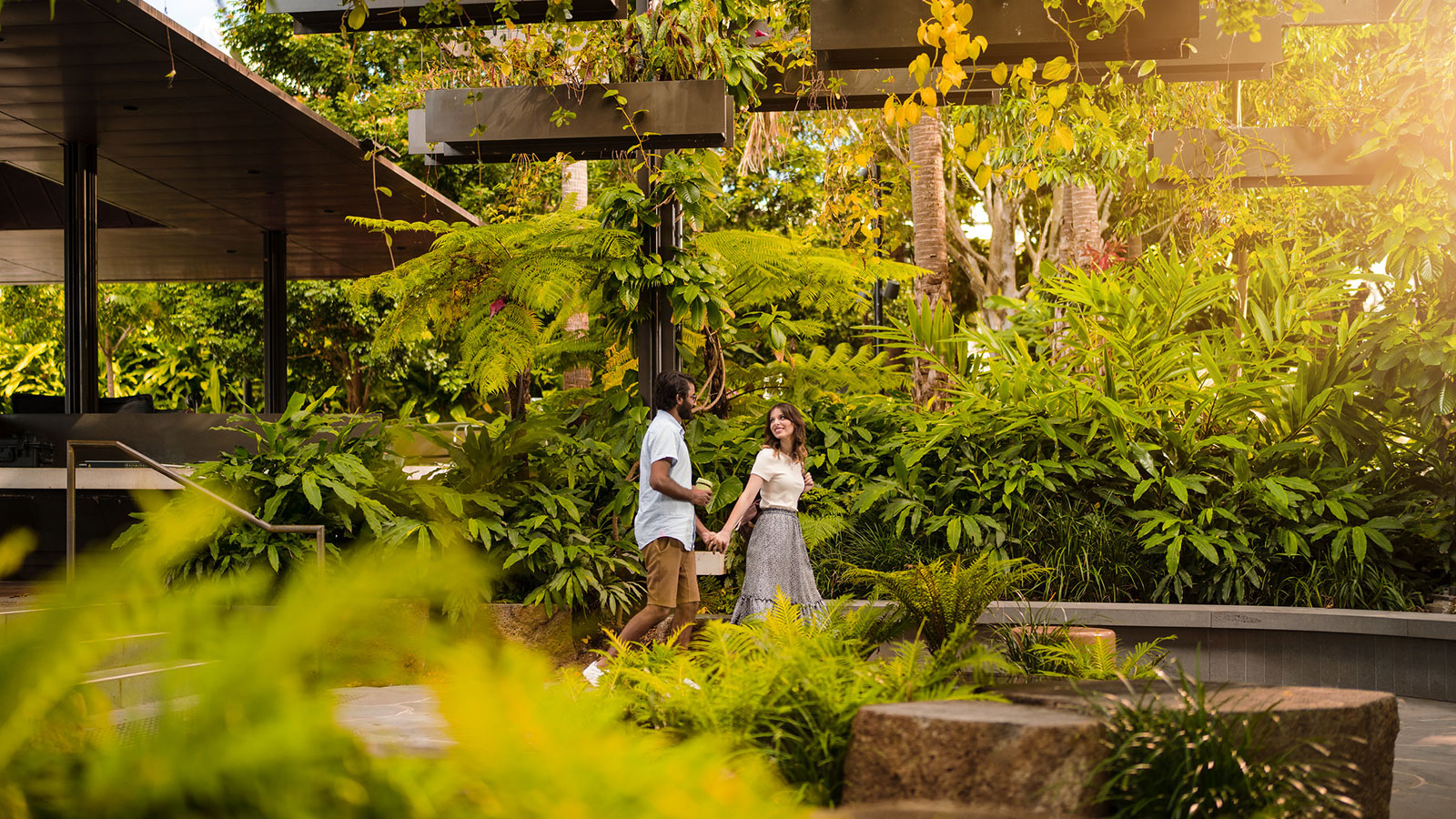 Couple walking through hanging garden at Riverside Green South Bank