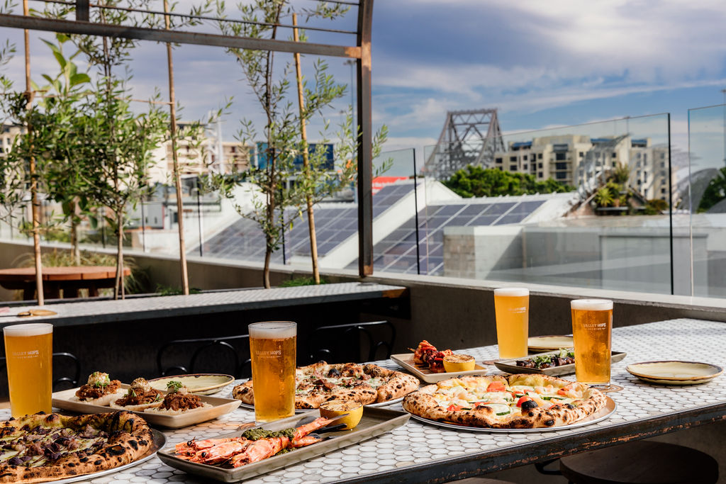 Pizzas and beers at Valley Hops Rooftop Bar, Fortitude Valley
