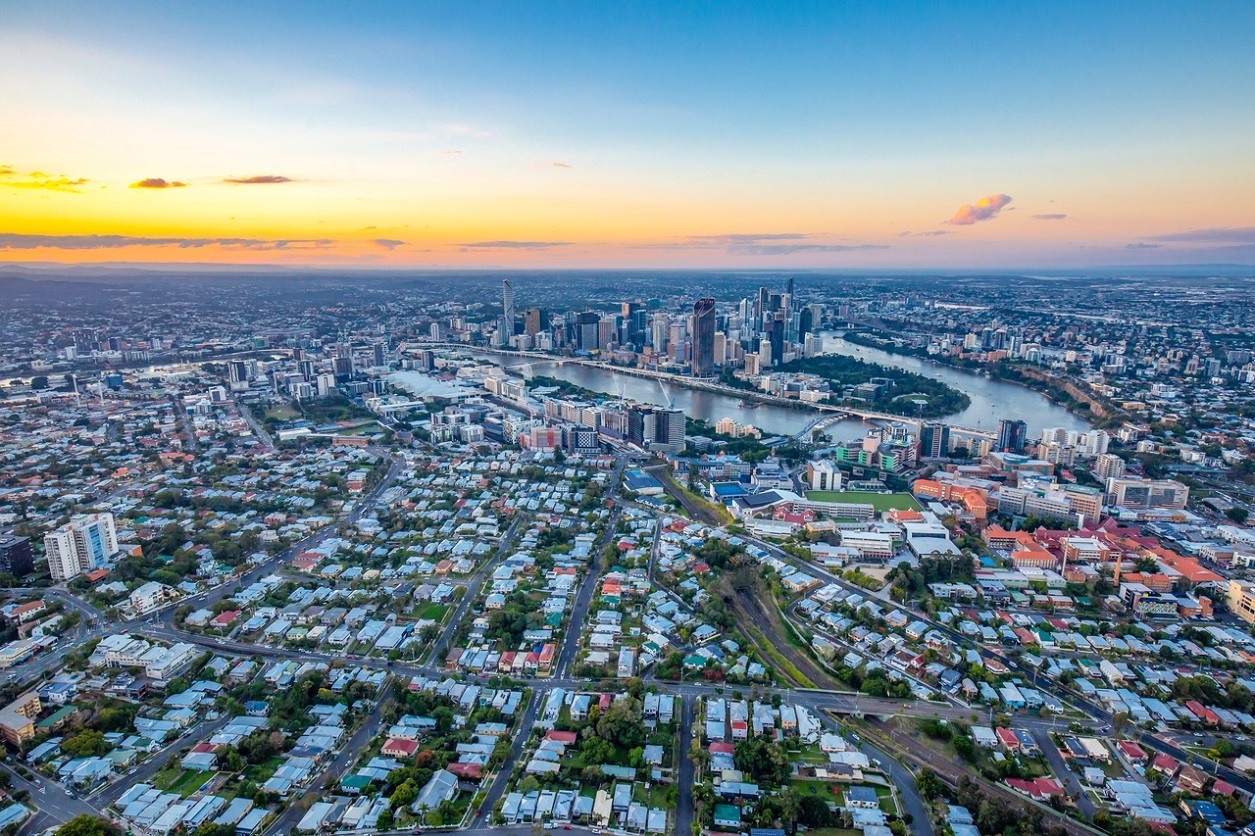 A bright sunset aerial image of Highgate Hill Woolloongabba Brisbane City and Brisbane River