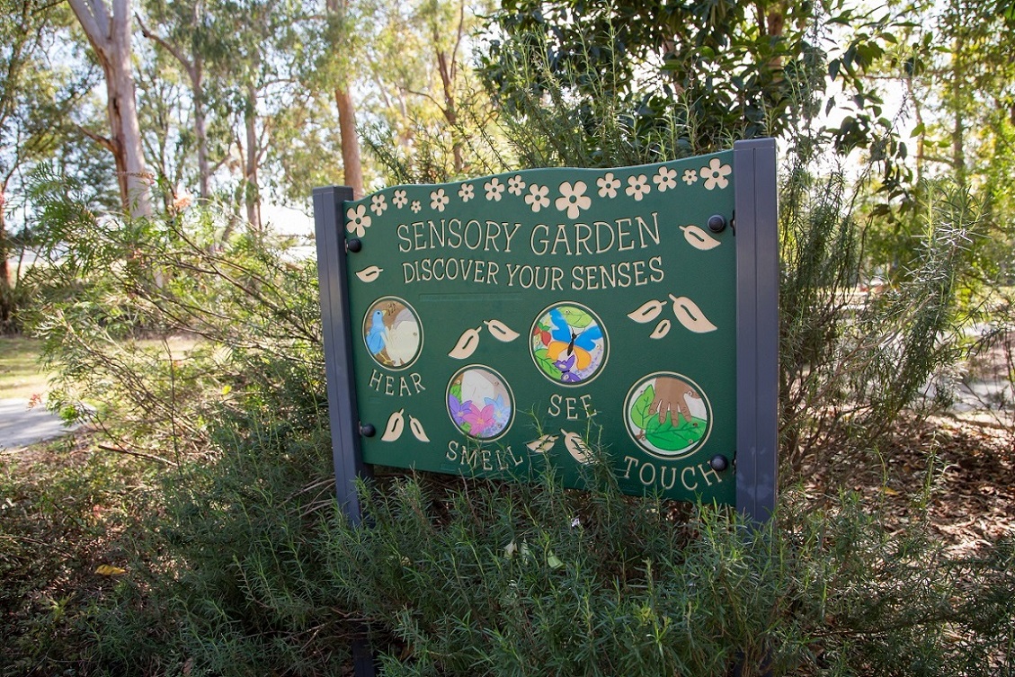 A sensory picnic ground sign.