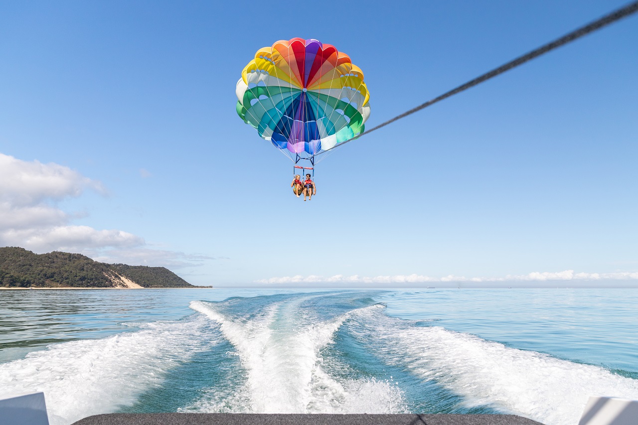 People parasailing at Moreton Island.