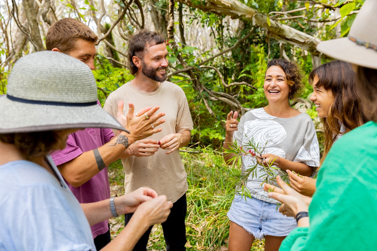 Group discussing Native Flora on Yura Tours - Minjerribah (North Stradbroke Island).
